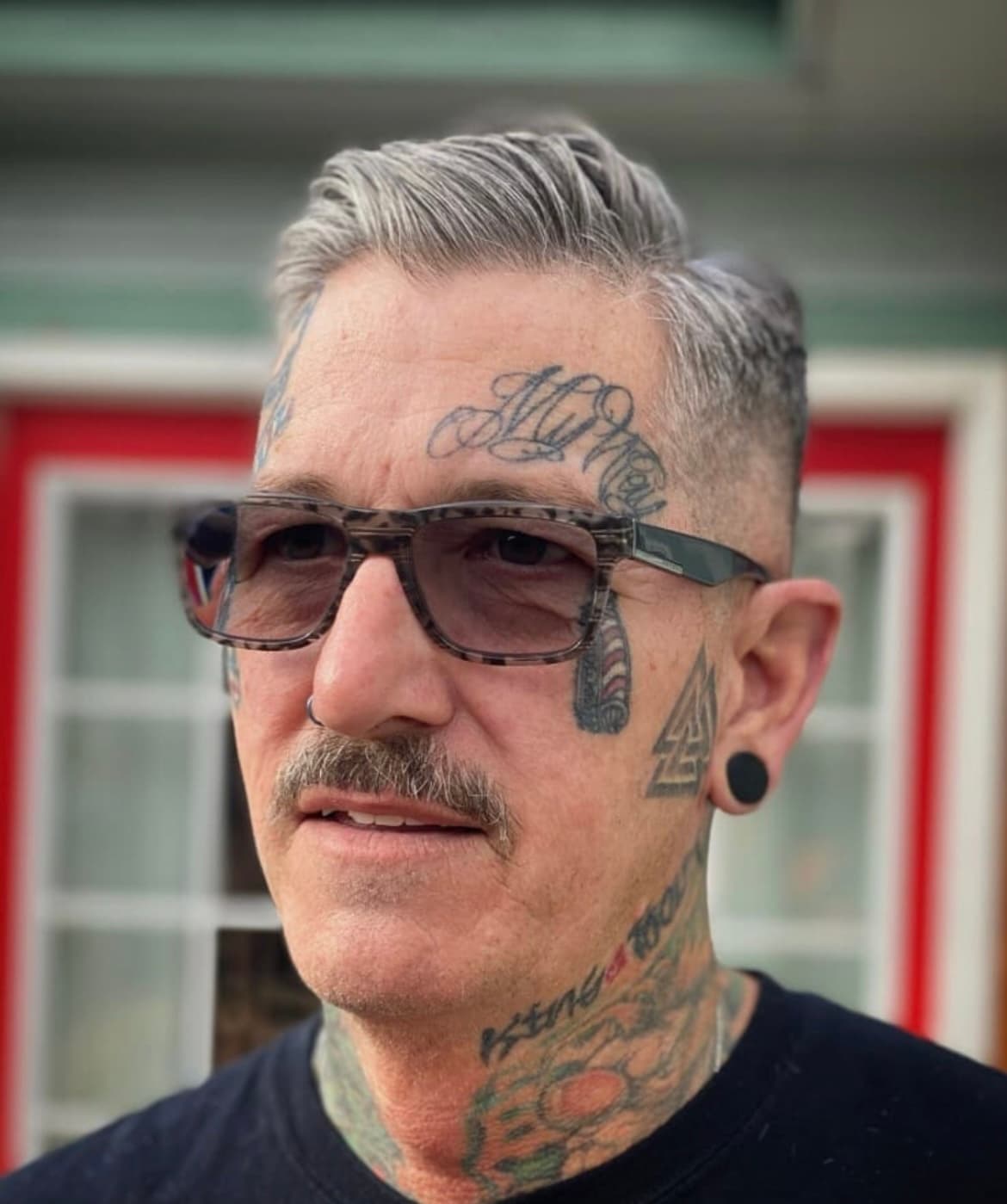 Sonny Boy, barber at Rob's Barbershop